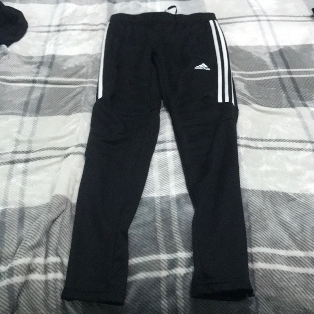 Black and white adidas pants